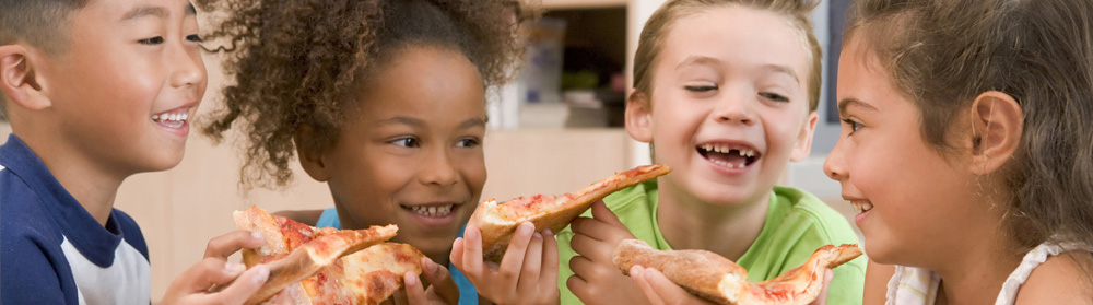 Image of children eating pizza